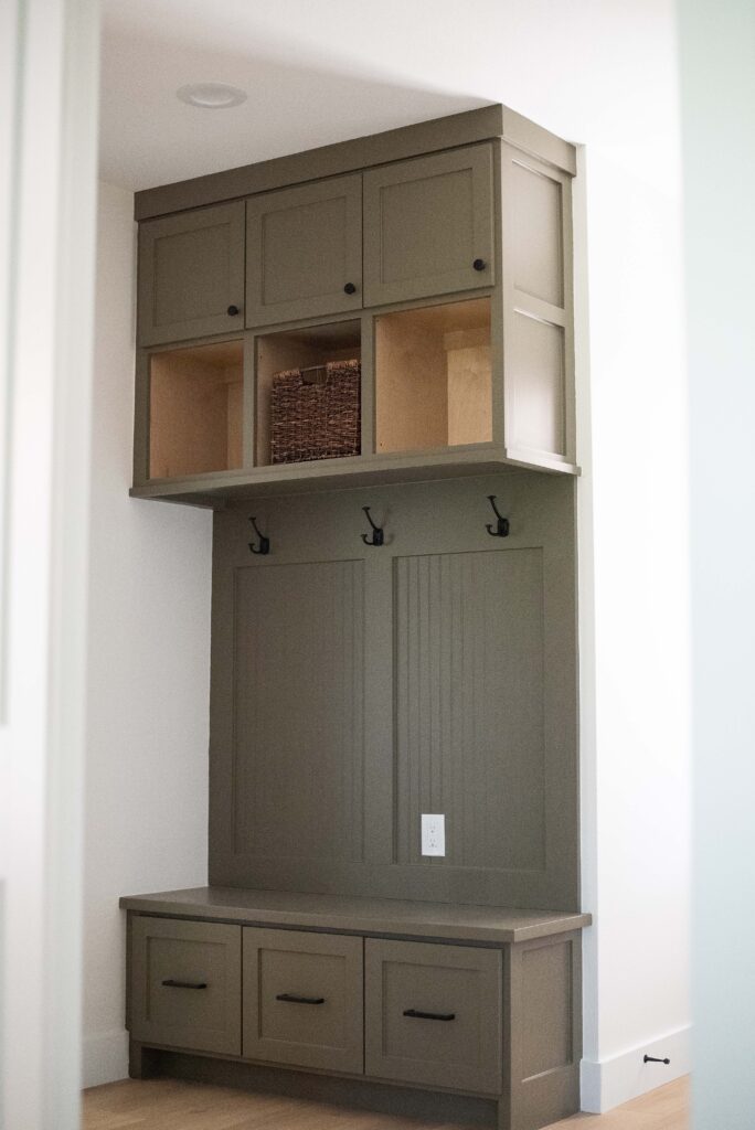 Green locker space near entryway