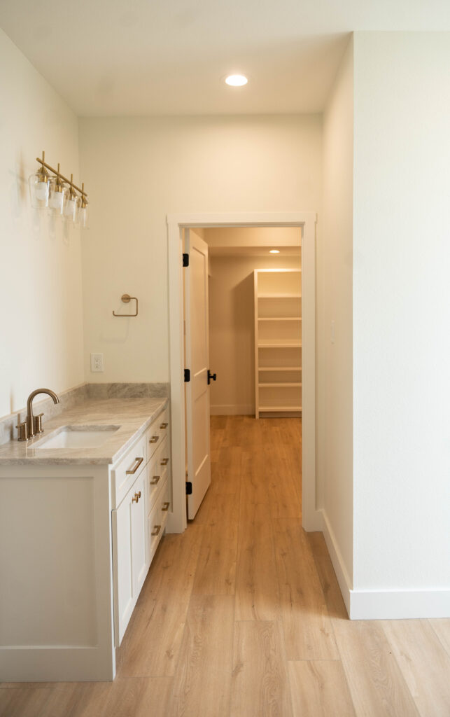 primary suite bathroom, Taj Mahal countertop, walk in closet, Walker County, TX