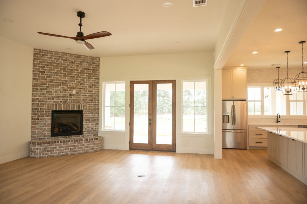 floor to ceiling brick fireplace, warm living room, Walker County, TX